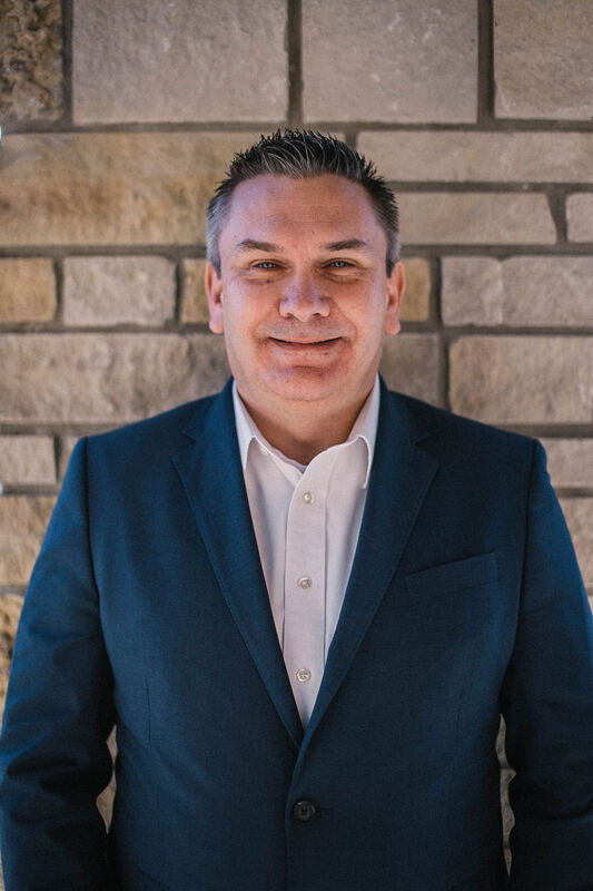 Dwayne A. Falk, President/CEO